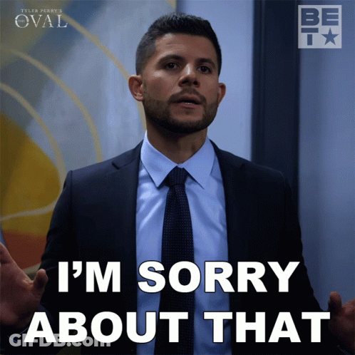 A Man In A Suit And Tie Is Sorry About That GIF