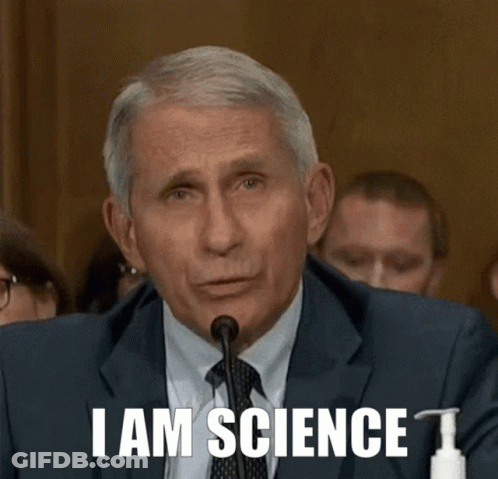 A Man In A Suit And Tie Is Speaking Into A Microphone And Says " I Am Science " GIF