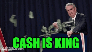 A Man In A Suit And Tie Is Standing At A Podium With Money Falling Around Him And The Words Cash Is King Written In Gree GIF