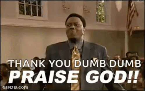 A Man In A Suit And Tie Is Standing In A Church And Saying `` Thank You Dumb Dumb Praise God '' . GIF