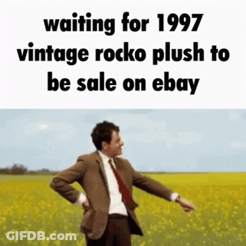 Man In Suit Waiting For Vintage Rocko Plush GIF