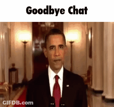 A Man In A Suit And Tie Is Standing In A Hallway And Says Goodbye Chat GIF