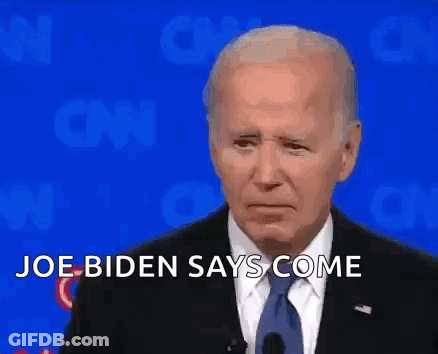 A Man In A Suit And Tie Is Standing In Front Of A Blue Background And Says `` Joe Biden Says Come '' . GIF