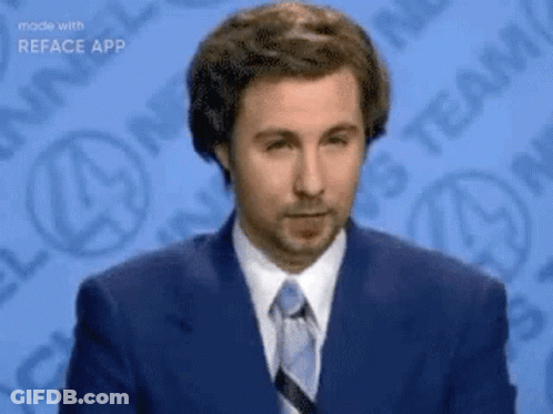 A Man In A Suit And Tie Is Standing In Front Of A Blue Background With Logos . GIF