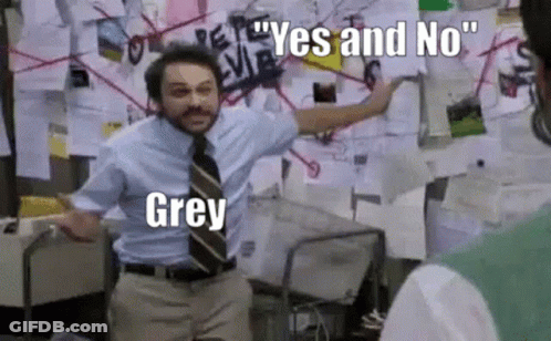 A Man In A Suit And Tie Is Standing In Front Of A Bulletin Board With Papers On It . GIF