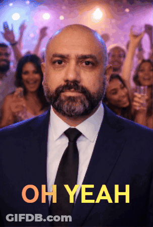 A Man In A Suit And Tie Is Standing In Front Of A Crowd With The Words Oh Yeah Above Him GIF