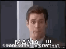 A Man In A Suit And Tie Is Standing In Front Of A Door And Says `` Mama Look At The Nips On That '' GIF