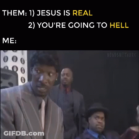 A Man In A Suit And Tie Is Standing In Front Of A Group Of Men And Says Jesus Is Real . GIF
