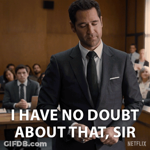 A Man In A Suit And Tie Is Standing In Front Of A Netflix Logo GIF
