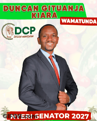 Man In Suit Standing In Front Of Duncan Gituanja Kiara Poster GIF