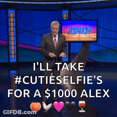 A Man In A Suit And Tie Is Standing In Front Of A Screen That Says Jeopardy GIF