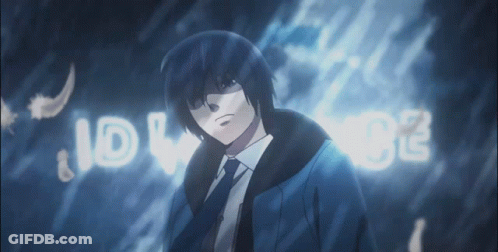 A Man In A Suit And Tie Is Standing In Front Of A Sign That Says Idl02 GIF