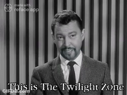 A Man In A Suit And Tie Is Standing In Front Of A Striped Curtain And Says `` This Is The Twilight Zone '' . GIF