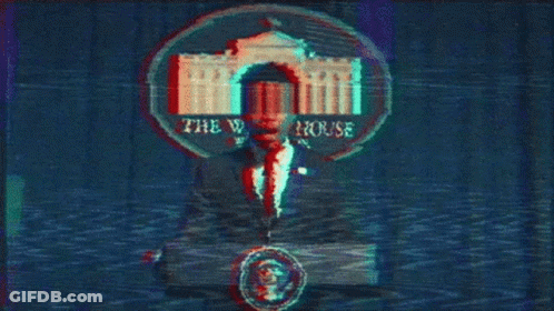 A Man In A Suit And Tie Is Standing In Front Of A White House And Says `` Deal With It '' . GIF