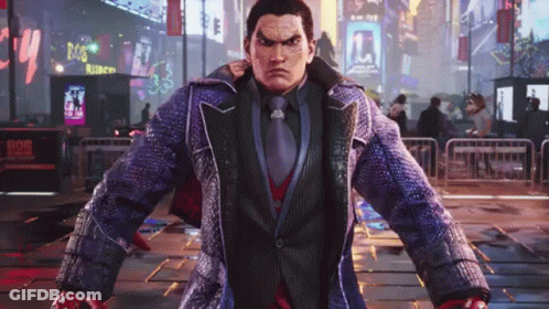 A Man In A Suit And Tie Is Standing In The Middle Of A City Street . GIF