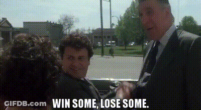 A Man In A Suit And Tie Is Standing Next To A Woman In A Car And Talking To Her . GIF