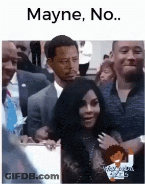 A Man In A Suit And Tie Is Standing Next To A Woman In A Crowd And Says Mayne No . GIF