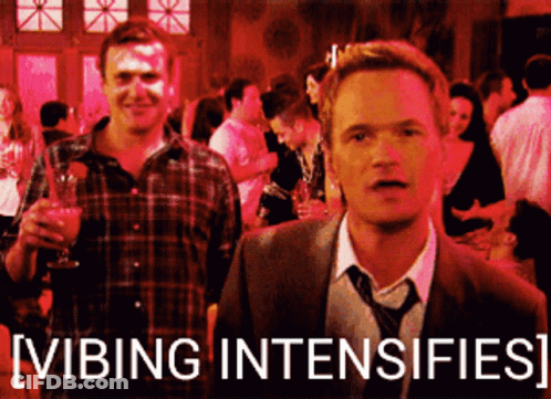 A Man In A Suit And Tie Is Standing Next To Another Man In A Plaid Shirt With The Words Vibing Intensifies GIF
