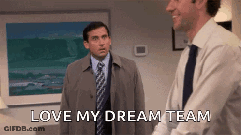 A Man In A Suit And Tie Is Standing Next To Another Man In A Suit And Tie And Says `` Love My Dream Team '' . GIF