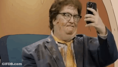 A Man In A Suit And Tie Is Taking A Selfie With A Cell Phone . GIF