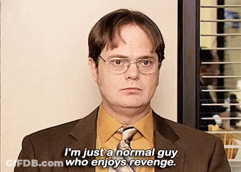 A Man In A Suit And Tie Is Talking About Being A Normal Guy Who Enjoys Revenge . GIF