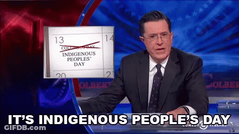 A Man In A Suit And Tie Is Talking About Indigenous Peoples ' Day GIF