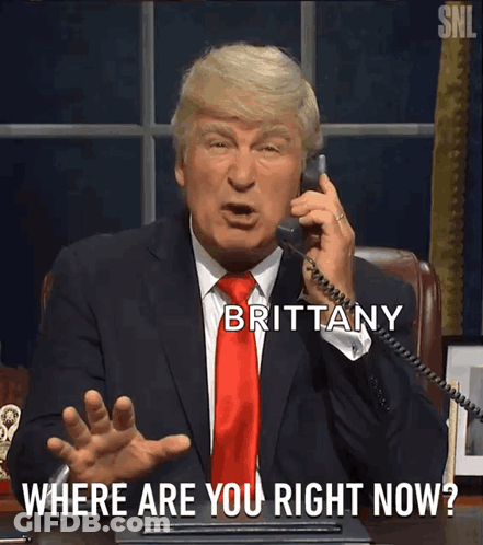 A Man In A Suit And Tie Is Talking On A Phone With Brittany Where Are You Right Now Written Below Him GIF