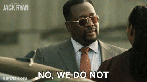 A Man In A Suit And Tie Is Talking To A Woman And Says " No We Do Not " GIF