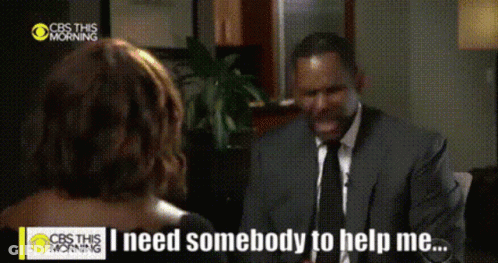 A Man In A Suit And Tie Is Talking To A Woman On The Cbs This Morning Show GIF