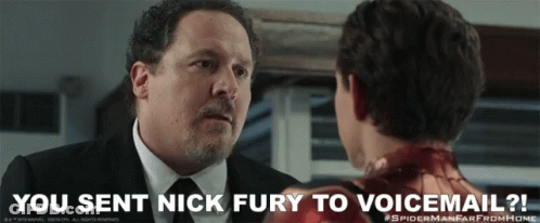 A Man In A Suit And Tie Is Talking To A Young Boy In A Spiderman Far From Home Poster GIF