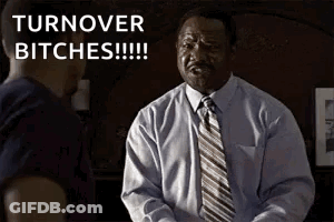 A Man In A Suit And Tie Is Talking To Another Man And Says `` Turnover Bitches '' . GIF