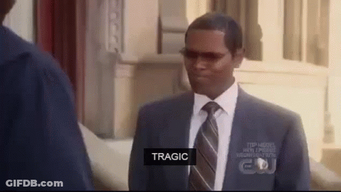 A Man In A Suit And Tie Is Talking To Another Man In A Suit And Tie . GIF