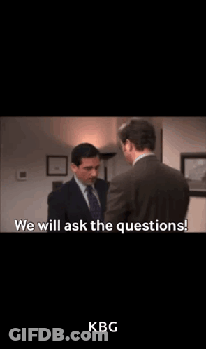 Two Men In Suits Talking GIF