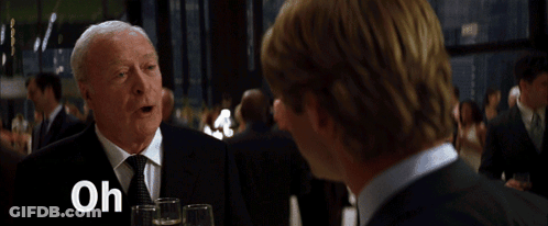 A Man In A Suit And Tie Is Talking To Another Man With The Words Oh You Have No Idea Below Him GIF