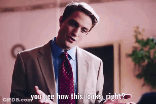 A Man In A Suit And Tie Is Talking To Someone And Says " You See How This Looks Right " GIF