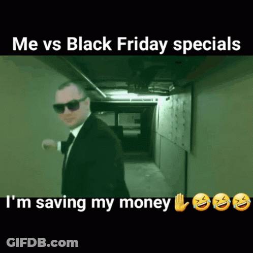A Man In A Suit And Tie Is Walking Down A Hallway In A Meme About Black Friday Specials GIF