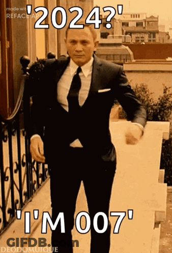 A Man In A Suit And Tie Is Walking Down A Set Of Stairs With The Caption " 2024 " GIF