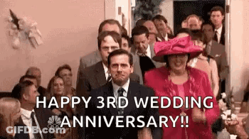 A Man In A Suit And Tie Is Walking Down The Aisle At A Wedding Ceremony . GIF