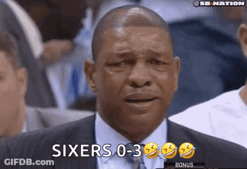 A Man In A Suit And Tie Is Watching A Basketball Game And Says Sixers 0-3 Bonus GIF