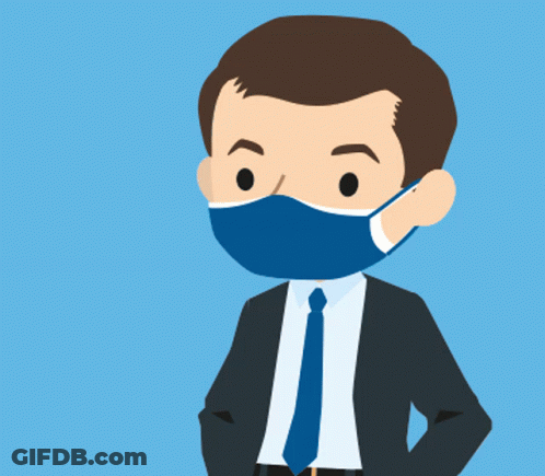 A Man In A Suit And Tie Is Wearing A Blue Mask And Giving A Thumbs Up GIF