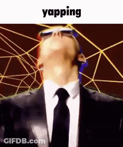 A Man In A Suit And Tie Is Wearing Sunglasses And Looking Up With The Word Yapping Below Him GIF
