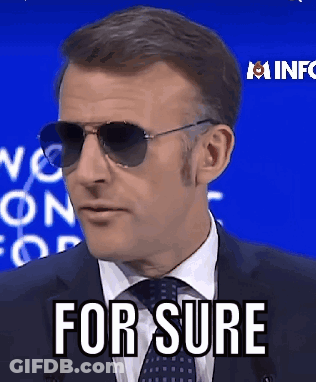 A Man In A Suit And Tie Is Wearing Sunglasses And Saying For Sure . GIF