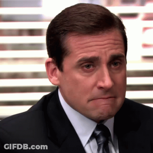 Man In Suit Making Funny Face GIF
