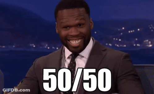 A Man In A Suit And Tie Points At The Number 50 GIF