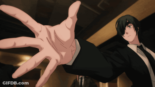 A Man In A Suit And Tie Reaches Out With His Hand GIF