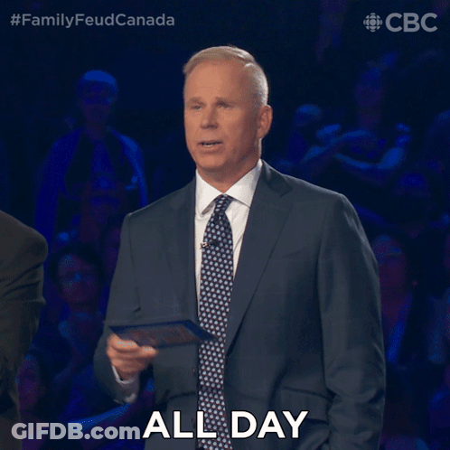 A Man In A Suit And Tie Says " All Day " In Front Of A Crowd GIF