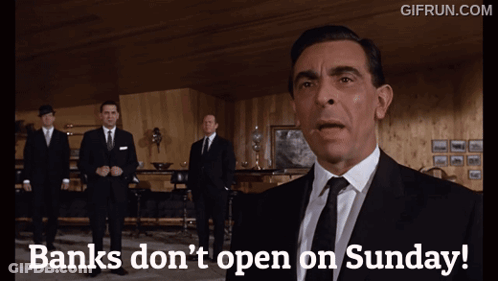A Man In A Suit And Tie Says " Banks Don 'T Open On Sunday " GIF