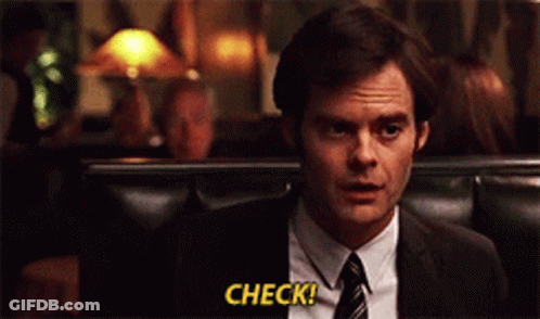A Man In A Suit And Tie Says Check In Yellow Letters GIF