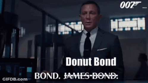 A Man In A Suit And Tie Says Donut Bond Bond James-Bond GIF