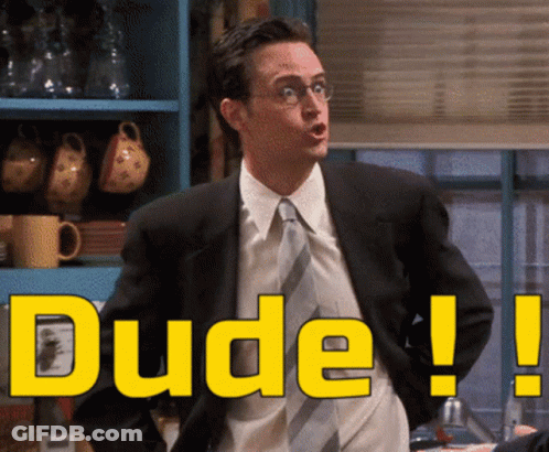A Man In A Suit And Tie Says Dude In Yellow GIF